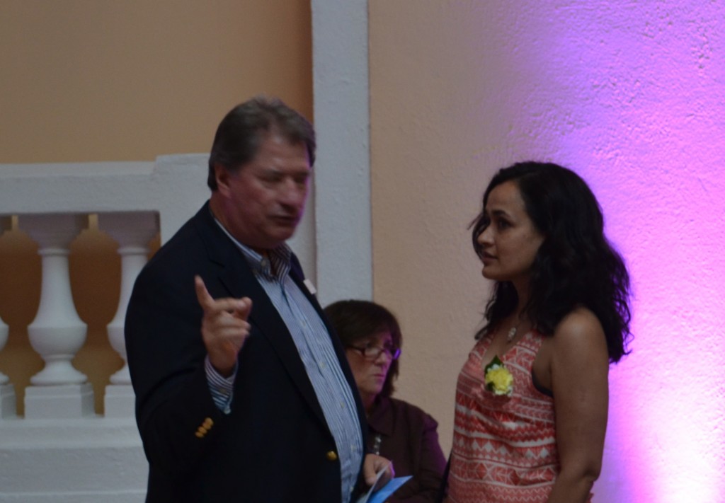 A man and woman talking to each other.