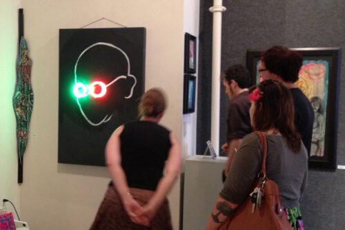 Wisdom in 3D, neon on chalkboard, 48x36 inches