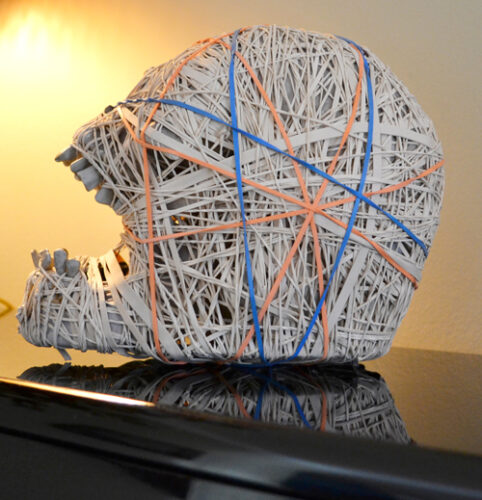 Stretched, found object sculpture