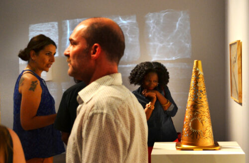 exhibiting artist Dahliya Elsayed gazes at the Precious Metal in Newark Museum