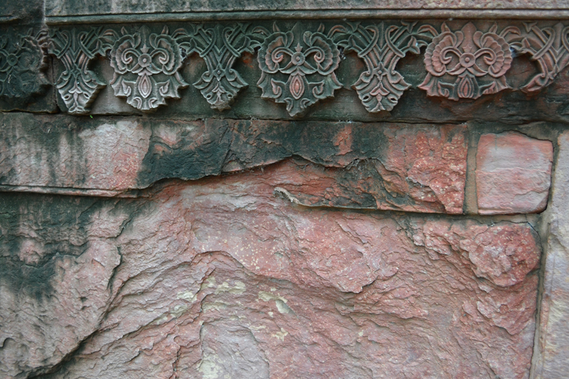 A close up of the pattern on the wall