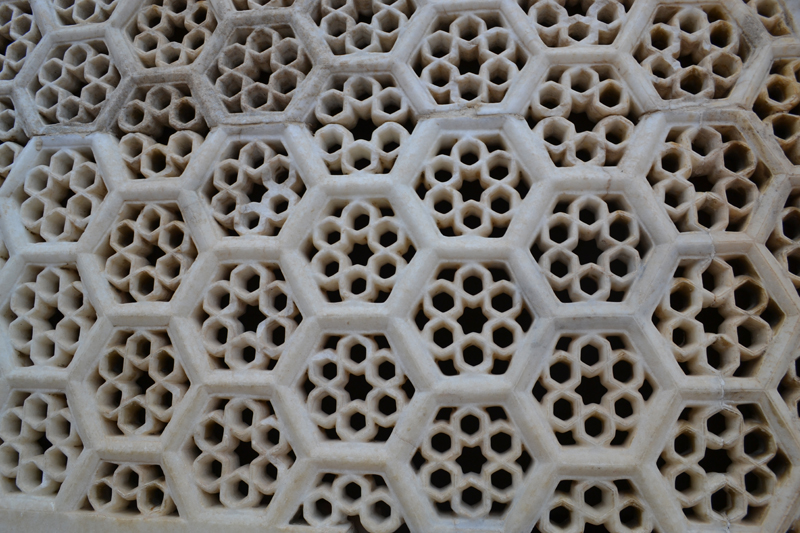 A close up of the pattern on the wall